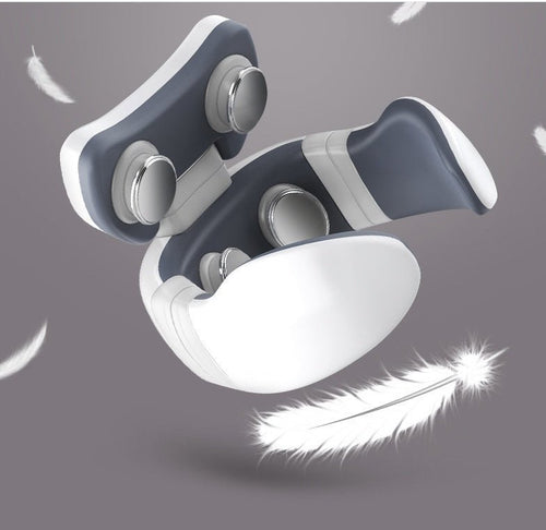 Electric neck massager with heat pads and massage nodes on a soft gray background with feathers